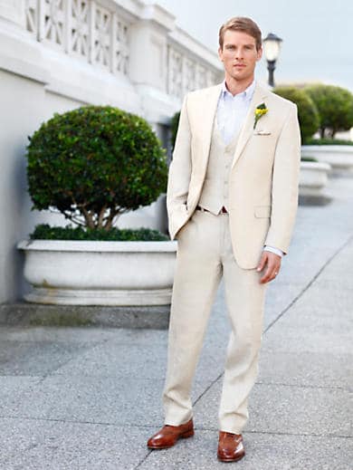 Groom wearing linen suit